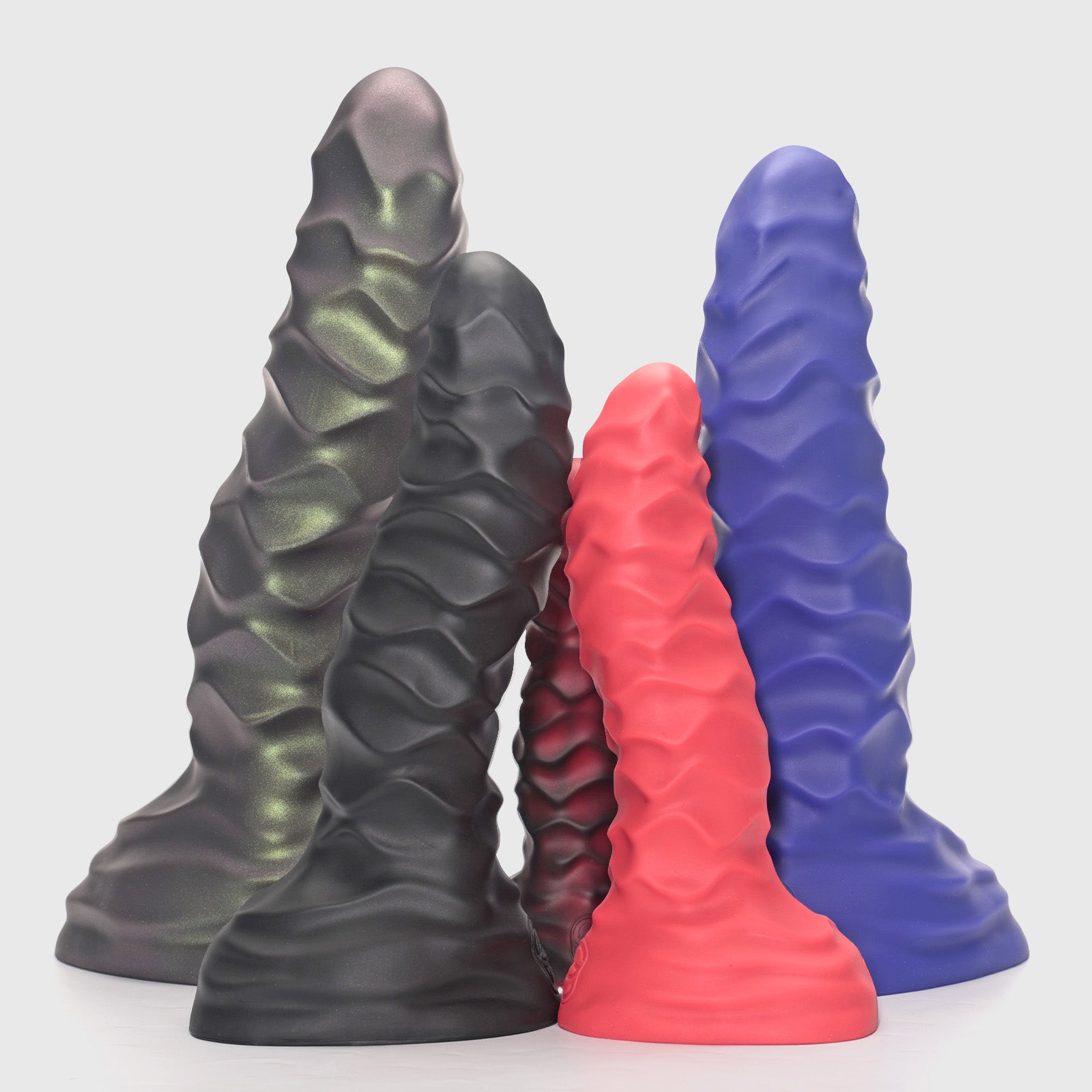 GreedyCluster ABADDON armored-ridge silicone dildo color range in Rust, Charcoal, Lava, Scarlett and Azure