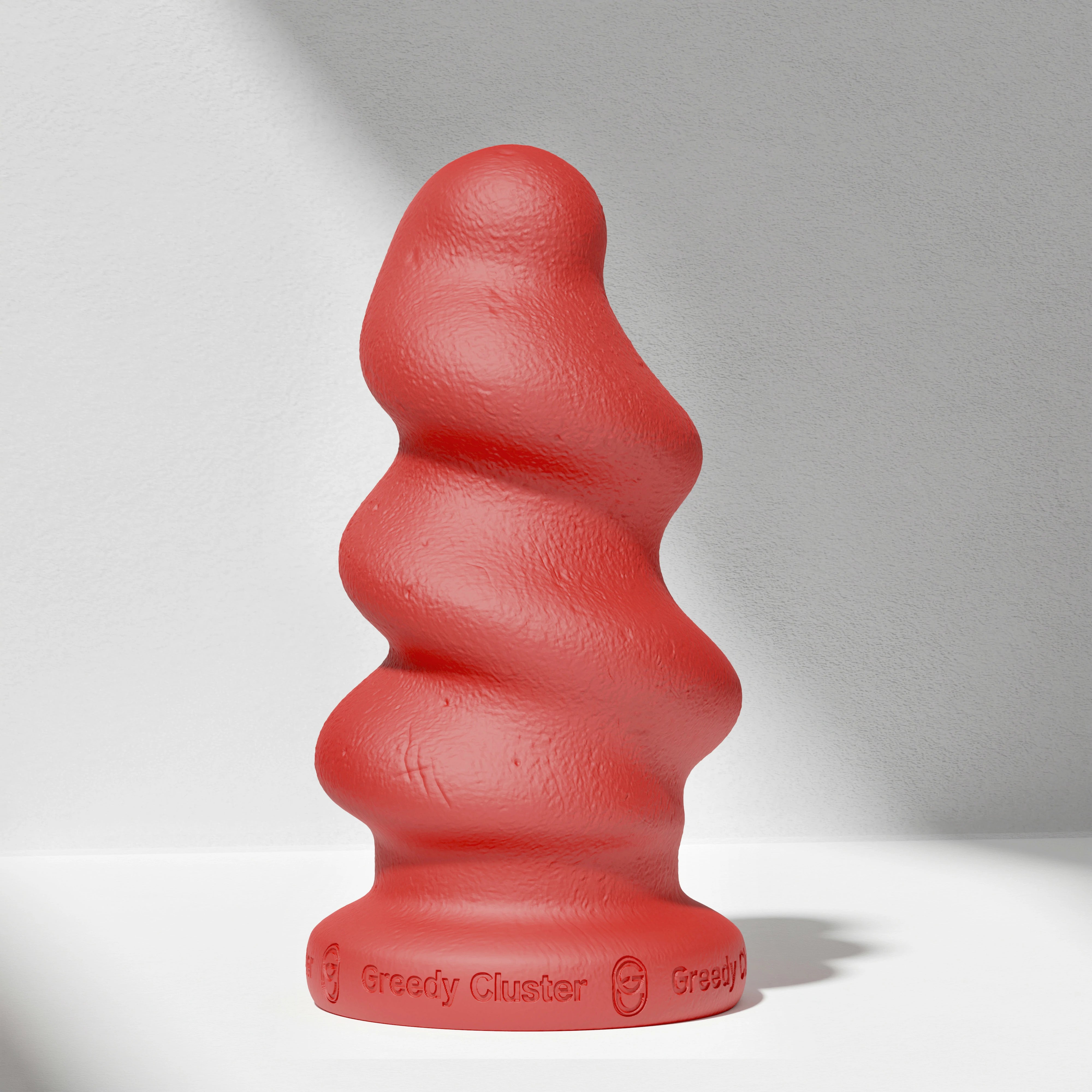GreedyCluster TORNADO STOPPER spiral silicone butt plug in Scarlett, angled view